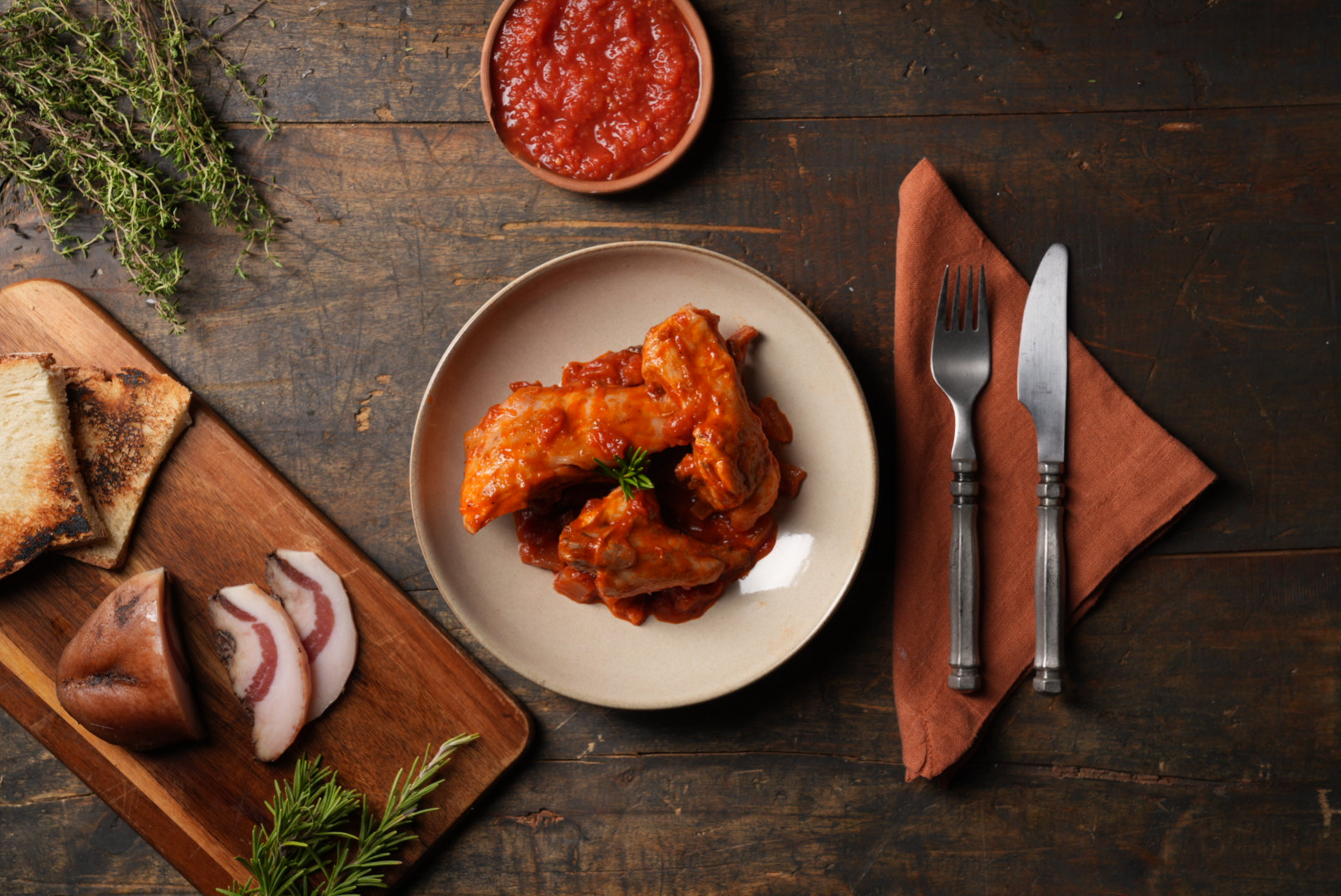 Chicken legs with tomato and bacon
