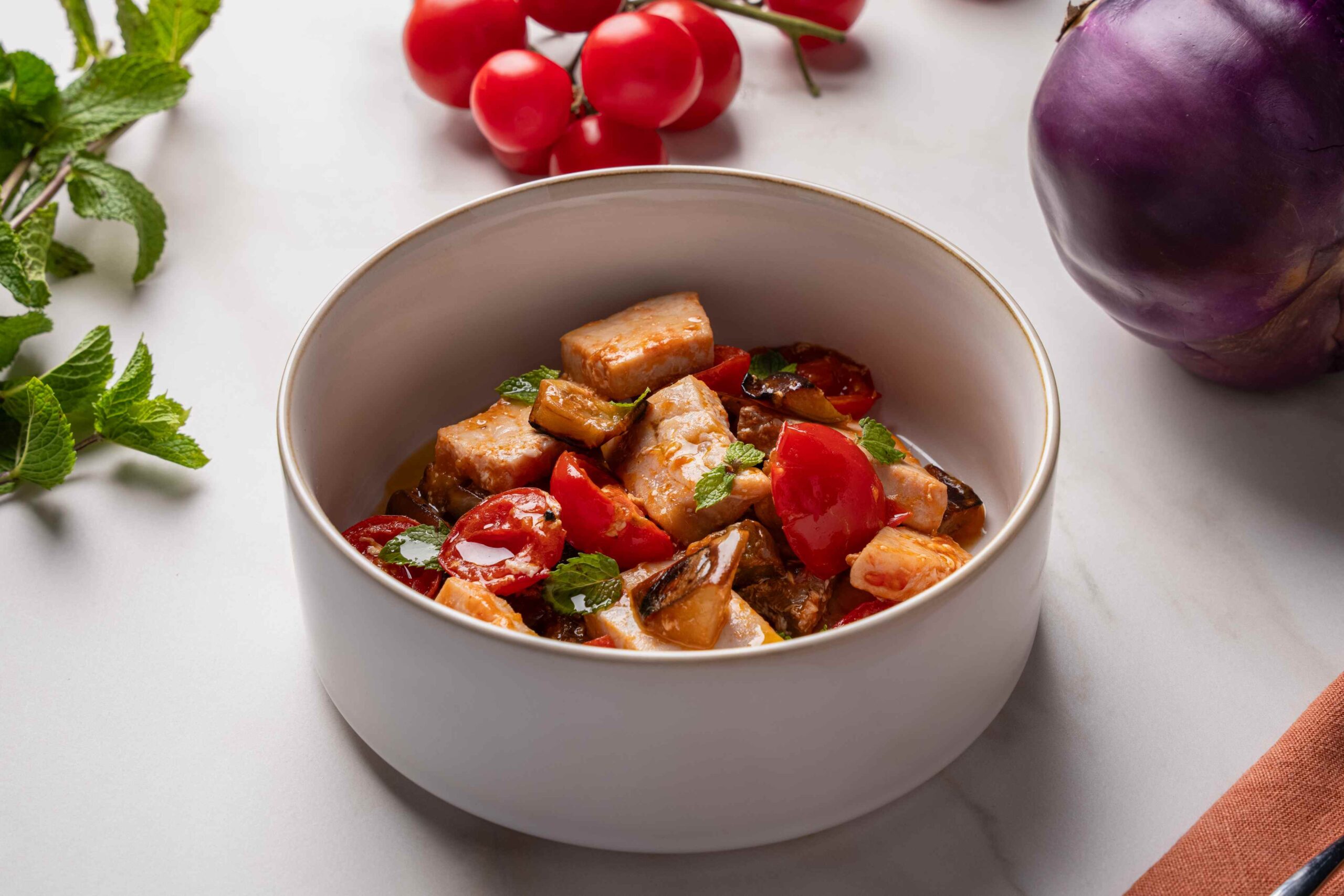 Swordfish, aubergines, cherry tomatoes and mint