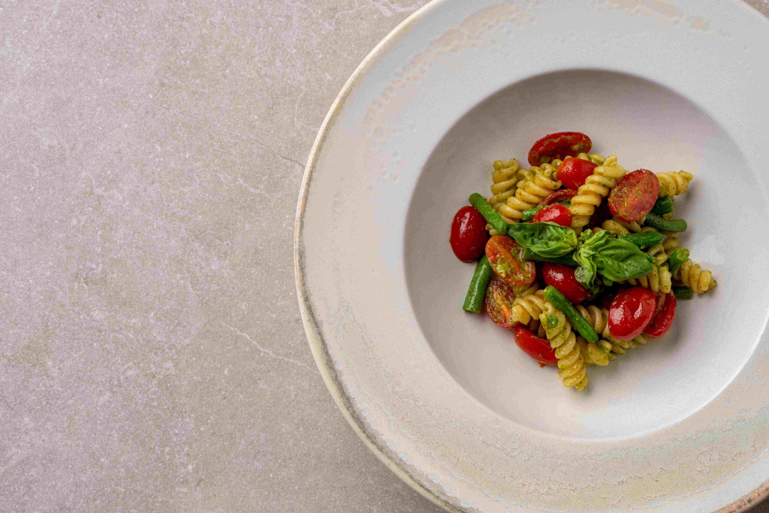 Fusilli with green beans, cherry tomatoes and pesto