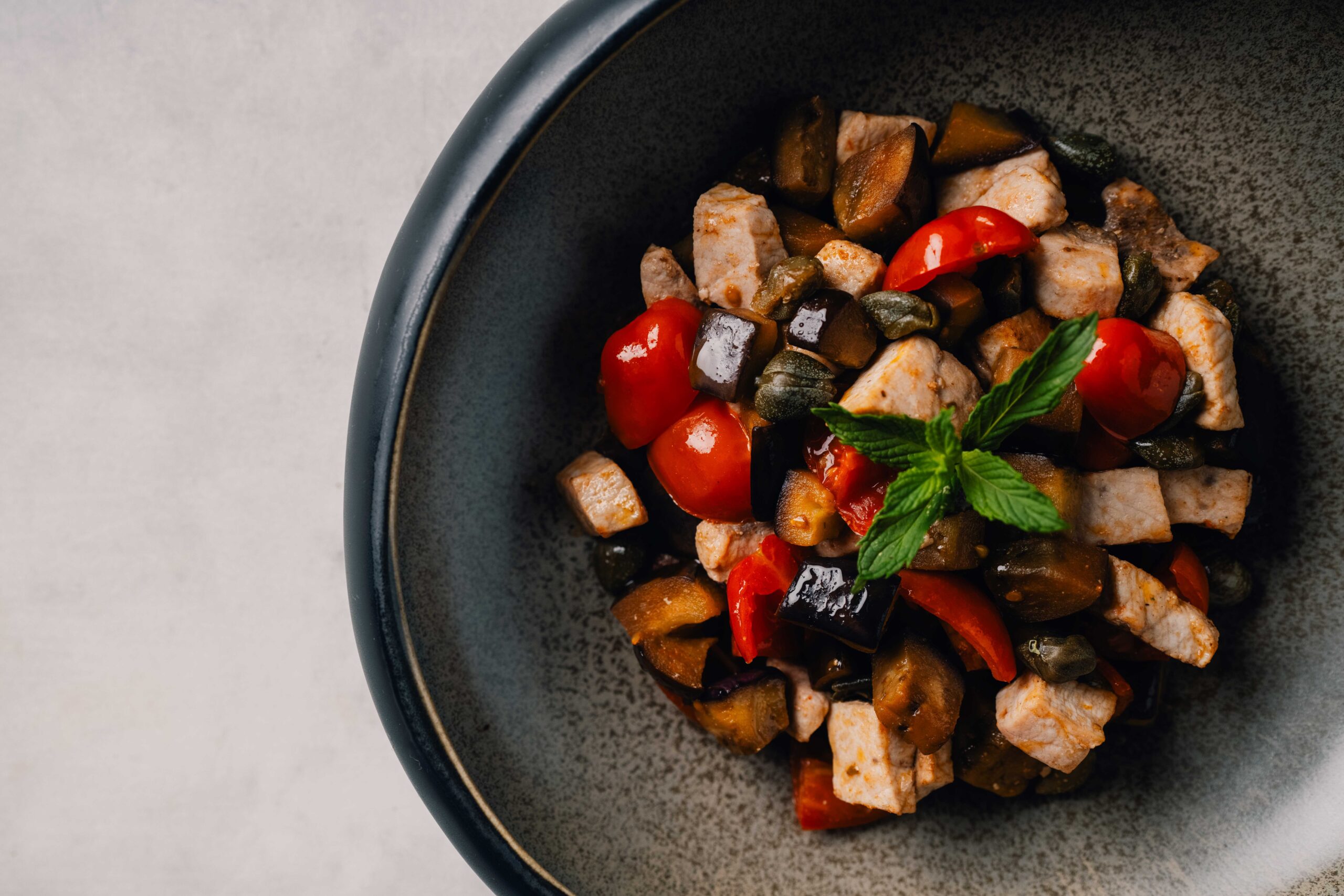 Swordfish, aubergines, cherry tomatoes and mint