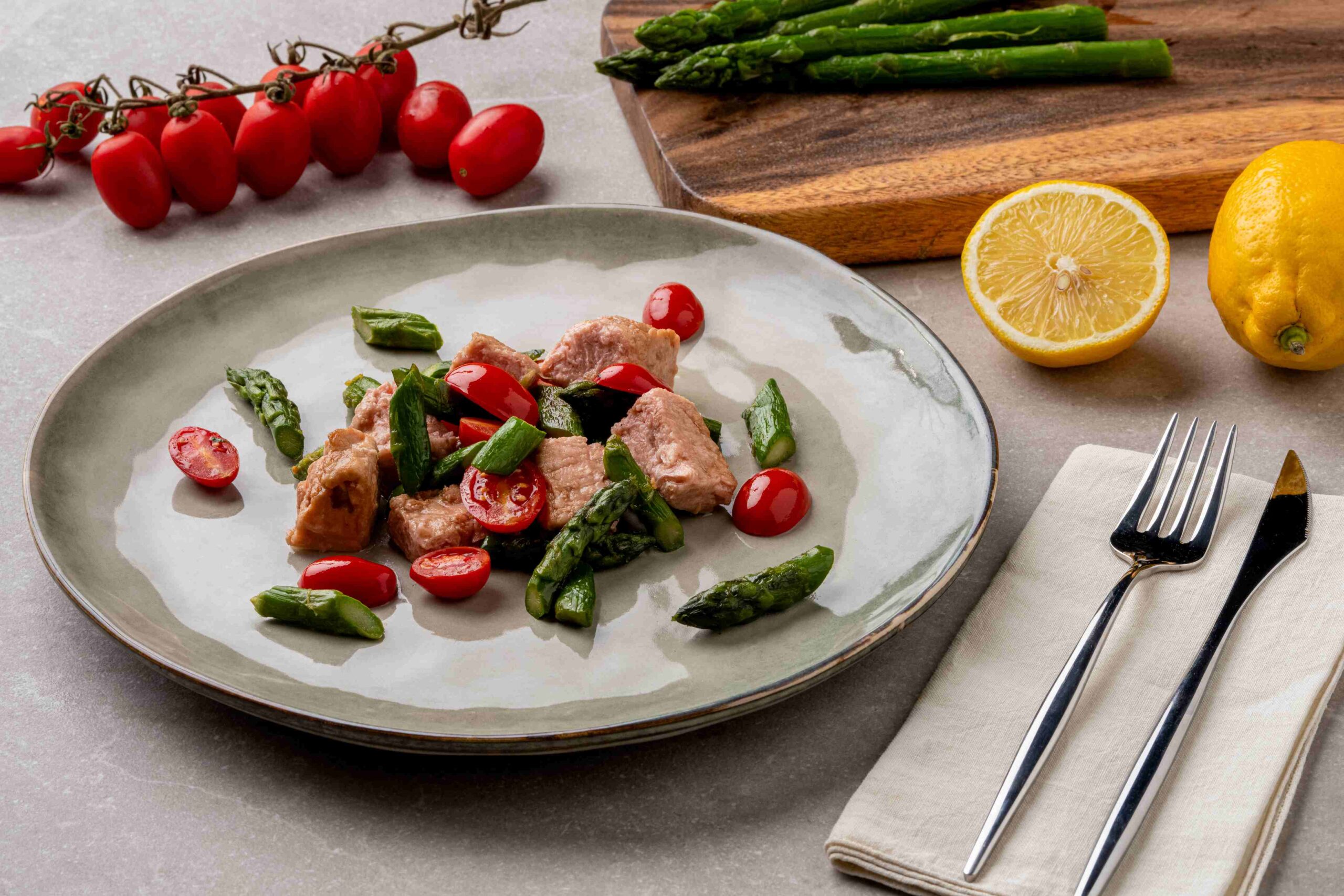 Veg salmon with asparagus and cherry tomatoes