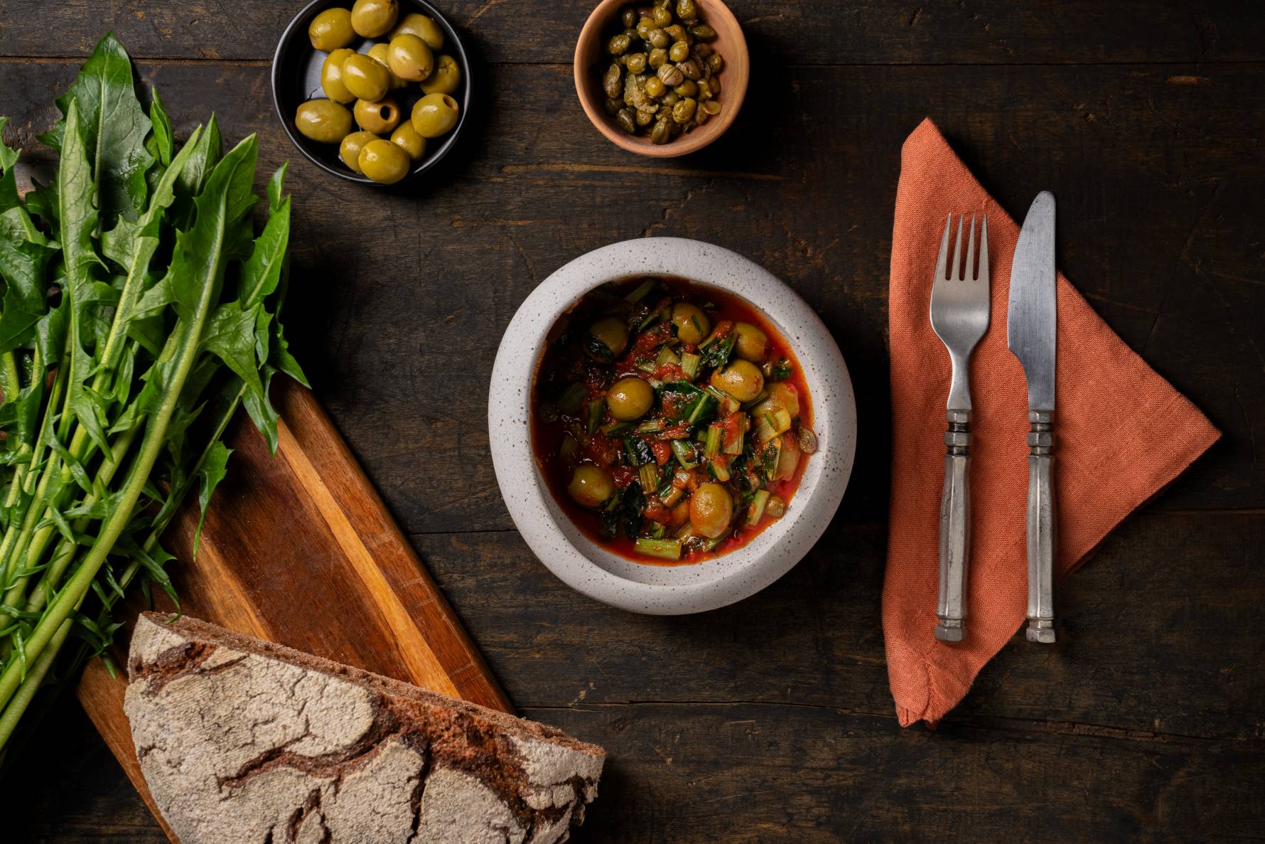 Romanesco broccoli with anchovies, capers, and olives