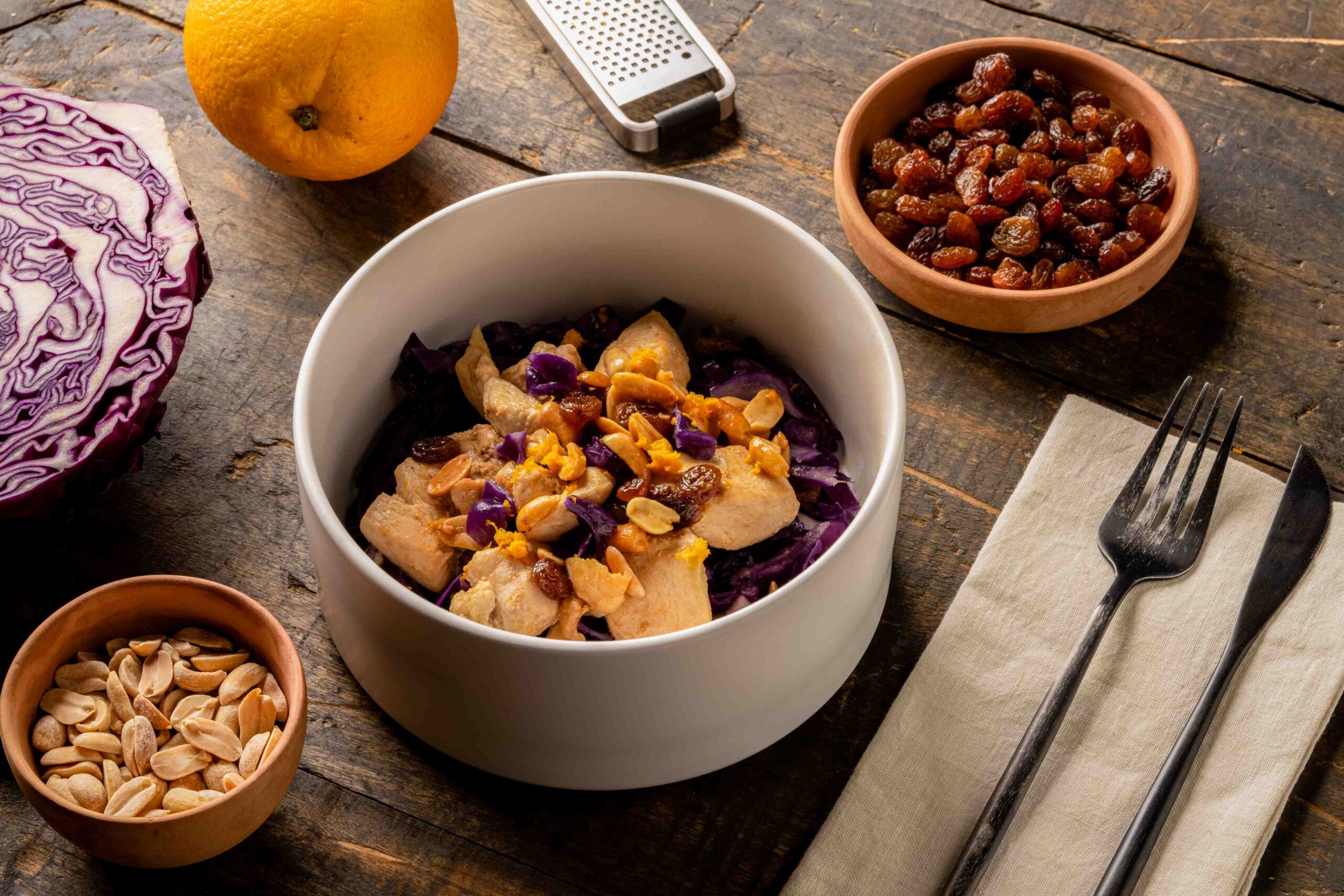 Chicken, cabbage, peanuts and raisins